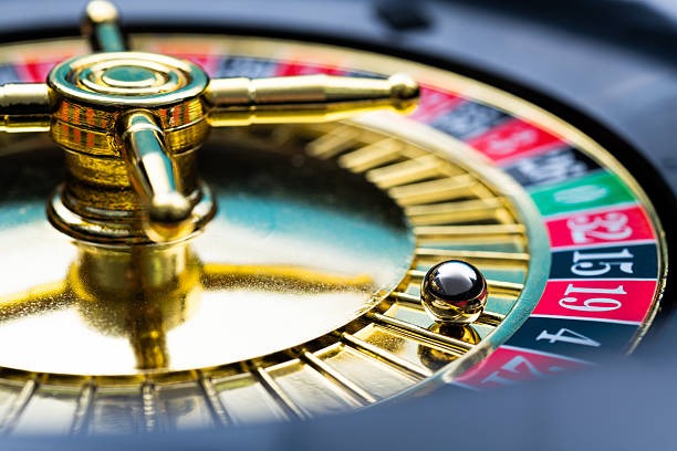 Card reveal game show with betting options displayed